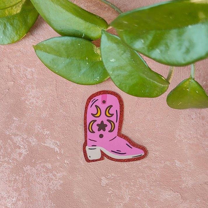 Pinkki buutsi tarra